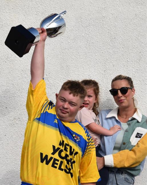 Delighted skipper Bleddyn Gibbs raises the Don Noott trophy aloft